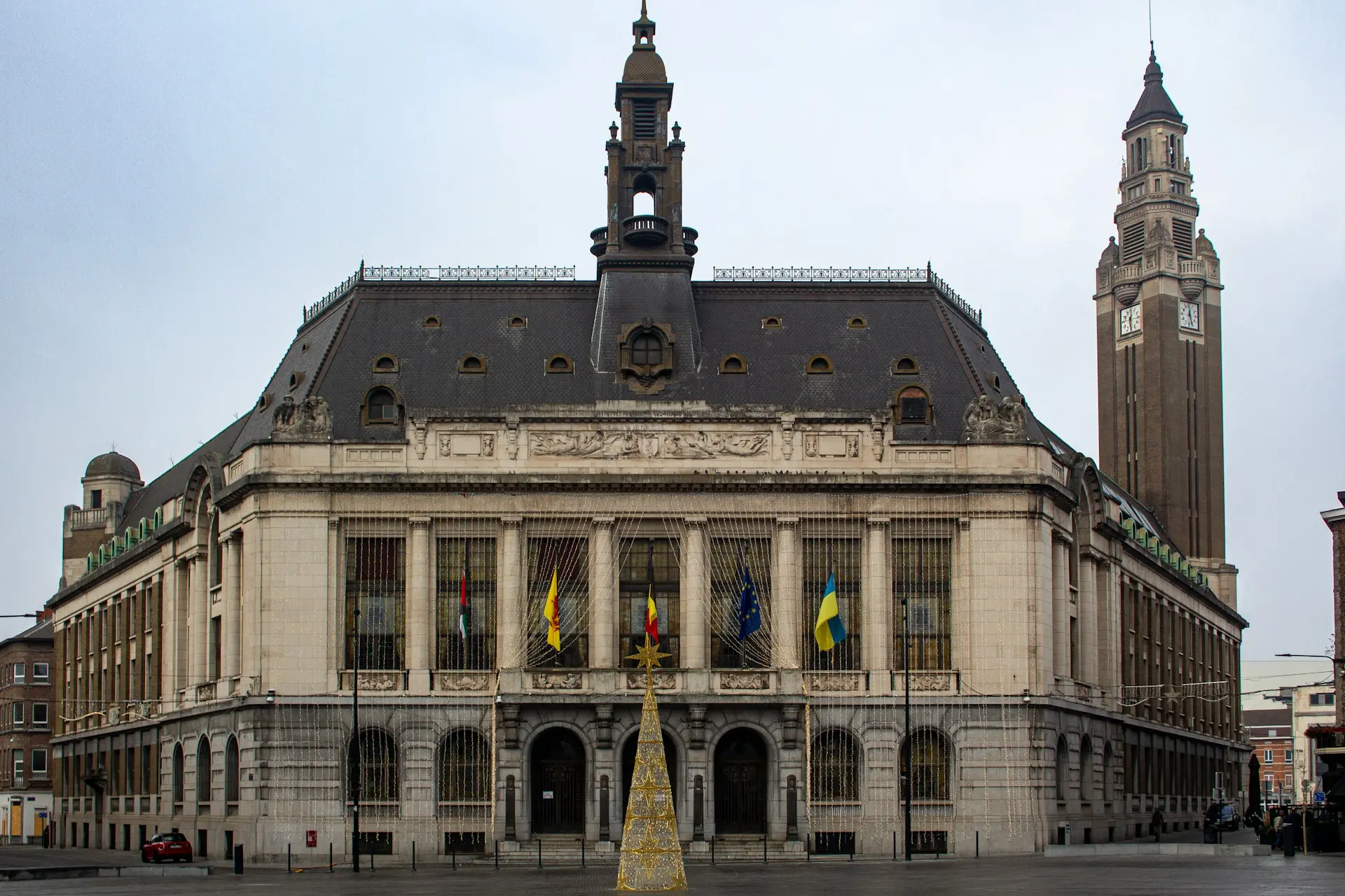 Grand building with ornate architecture and tall tower.